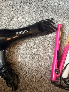 4 piece used sell, blow dryer, flat iron, mini 1/2" & large 1" curling iron.